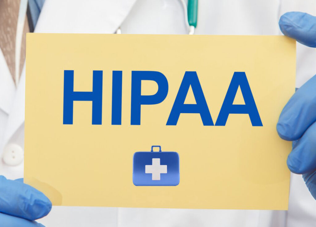 A Doctor Holding HIPPA Standards Card
